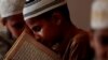 A student memorizes the Quran at a madrassa in Murree, Pakistan, Sept. 27, 2017