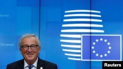 FILE - European Commission President Jean-Claude Juncker holds a news conference in Brussels, Oct. 18, 2018. 