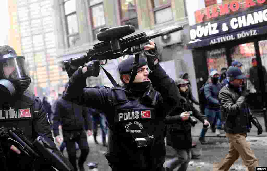 Turkish riot police use rubber pellets to disperse pro-Kurdish demonstrators during a protest against security operations in the Kurdish dominated southeast, in central Istanbul, Turkey January 3, 2016. 