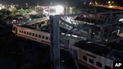 This photo released by Military News Agency shows a general view at the site of a train derailment in Lian in northern Taiwan, Oct. 21 2018. 