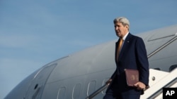 U.S. Secretary of State John Kerry gets off his plane upon his arrival at Rome's Ciampino airport, Feb. 1, 2016. 