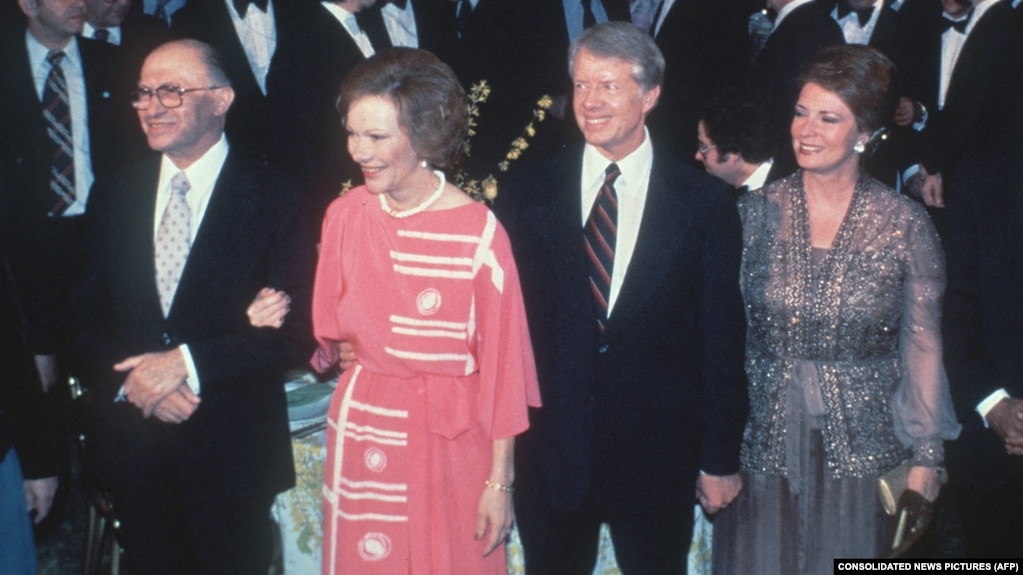 Couples présidentiels : Les Égyptiens Anwar al-Sadat et Jihan al-Sadat, et les Américains Jimmy Carter et Rosalynn Carter à la Maison Blanche, le 26 mars 1979.