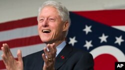 Former President Bill Clinton campaigns for his wife, Democratic presidential candidate Hillary Clinton, at the Clifton Cultural Arts Center in Cincinnati, Feb. 12, 2016.