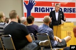 Former Florida Gov. Jeb Bush speaks during a town hall meeting, May 16, 2015, at Loras College in Dubuque, Iowa.