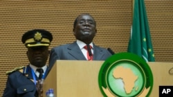 Zimbabwe president Robert Mugabe delivers a speech during the opening ceremony of the 26 ordinary of the African Union Summit in Addis Ababa, Jan. 30, 2016.