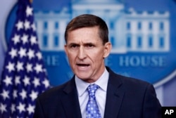 FILE - National security adviser Michael Flynn speaks during the daily news briefing at the White House, in Washington, Feb. 1, 2017. Flynn said the administration was putting Iran "on notice" after it tested a ballistic missile.