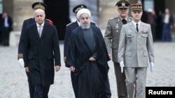 لوران فبیوس وزیر خارجۀ فرانسه از حسن روحانی رئیس جمهور ایران پذیرایی کرد.