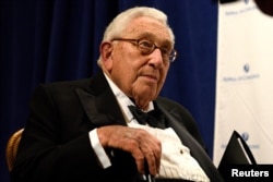 FILE - Former U.S. Secretary of State Henry Kissinger, who met with President Vladimir Putin on a trip to Russia, February, 2016, will reportedly meet with Donald Trump, Thursday, Nov. 17, 2016.