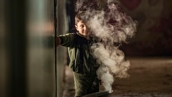 A Syrian child displaced from Ras al-Ain, a border town controlled by Turkey and its Syrian proxies, is pictured in a school turned into a shelter in the city of Hasakeh, April 5, 2020.