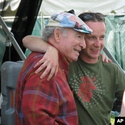 George Wein, with a fan, at the 2010 Newport Jazz Festival