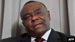 Former vice president of Democratic Republic of Congo Jean-Pierre Bemba addresses media representatives during a press conference in Brussels, July 24, 2018. 