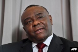 Former vice president of Democratic Republic of Congo Jean-Pierre Bemba addresses media representatives during a press conference in Brussels, July 24, 2018.