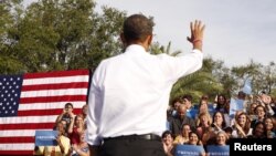 President Obama waves to supporters at a rally in Tampa, Florida, Oct. 25, 2012.