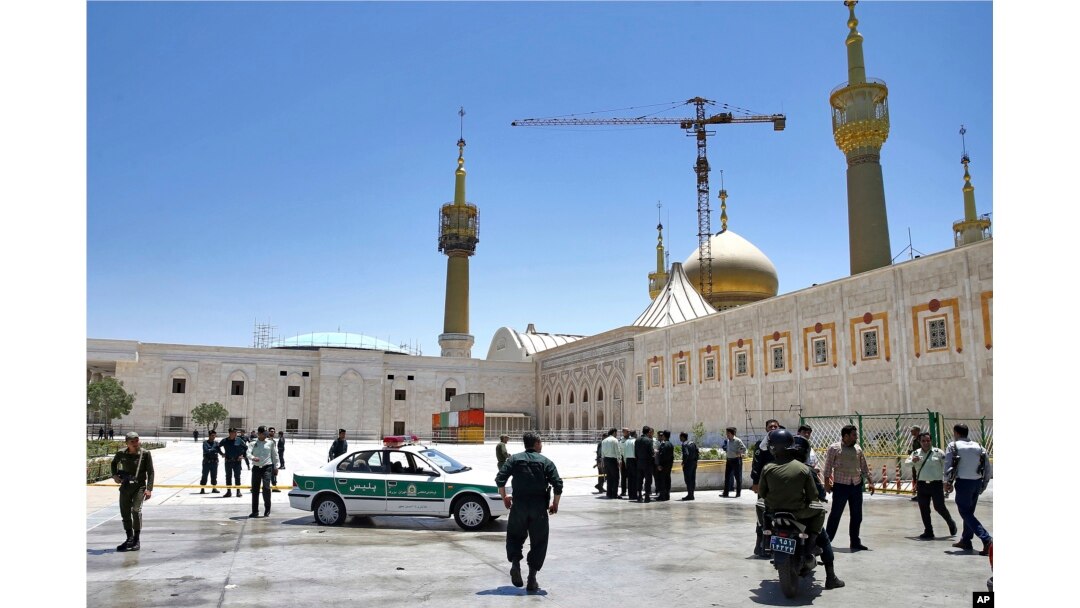 Police officers patrol the scene, around the shrine of late Iranian revolutionary founder Ayatollah Khomeini, after an attack by several perpetrators in Tehran, Iran, June 7, 2017.