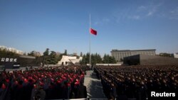 Warga China menghadiri upacara peringatan pembantaian Nanjing di bekas ibukota China, Nanjing, provinsi Jiangsu (13/12).