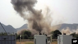 A huge explosion is seen near a United Nations compound in South Kordofan state, June 14, 2011