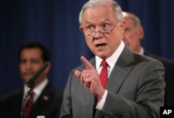 FILE - In this Aug. 4, 2017, photo, U.S. Attorney General Jeff Sessions, speaks at a news conference at the Justice Department in Washington.