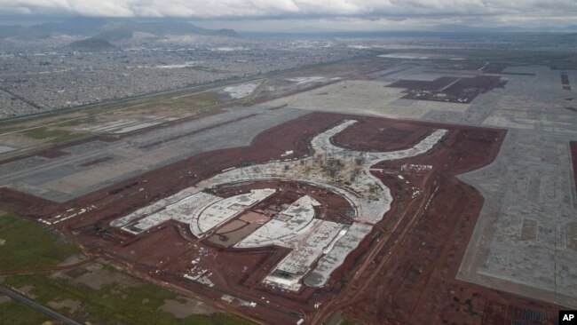 FILE - Progress is seen on the construction of new airport in Texcoco, Mexico, Oct. 17, 2018.