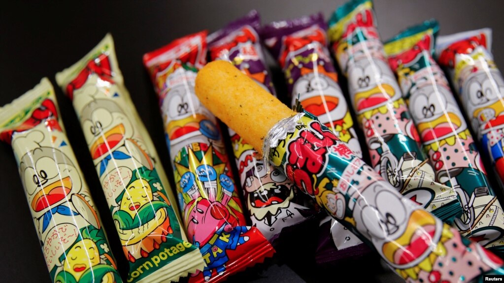 Several kinds of 'Umaibo', a popular Japanese corn snack, are seen at a store in Tokyo, Japan January 25, 2022. (REUTERS/Akira Tomoshige)