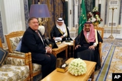 U.S. Secretary of State Mike Pompeo, left, meets with Saudi Arabia's King Salman in Riyadh, Saudi Arabia, Oct. 16, 2018.