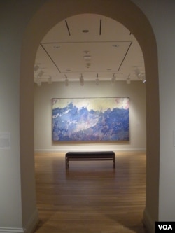 The painting "Aspiration" by Augustus Vincent Tack is seen at The Phillips Collection, in Washington, D.C., March 2014. (J. Taboh/VOA)