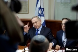 Israeli Prime Minister Benjamin Netanyahu attends a weekly cabinet meeting in Jerusalem, Dec. 25, 2016.
