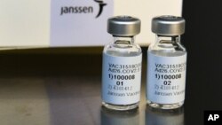 This Sept. 2020 photo provided by Johnson & Johnson shows the investigational Janssen COVID-19 vaccine. Johnson & Johnson's long-awaited COVID-19 vaccine appears to protect against symptomatic illness with just one shot – not as strong as some two-shot ri