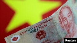 Các quan chức Việt Nam lâu nay luôn nhận định "Tiền trong dân còn nhiều".
