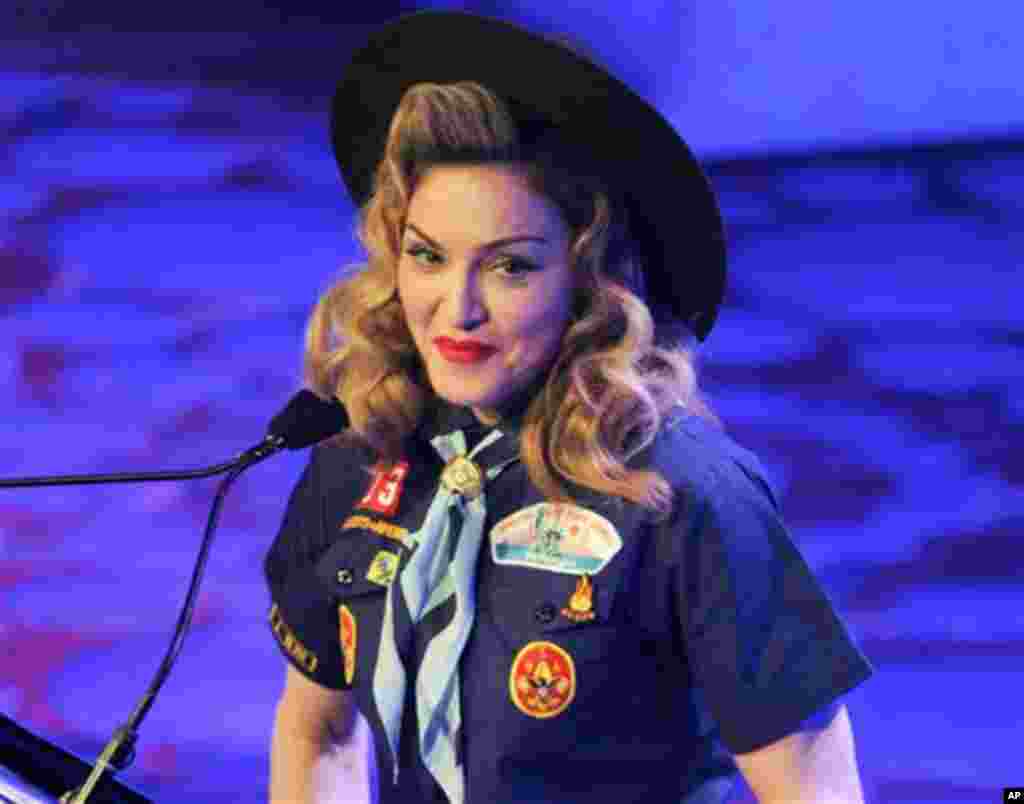 Singer Madonna addresses the audience at the 24th Annual GLAAD Media Awards at the Marriott Marquis on Saturday March 16, 2013 in New York. Madonna presented CNN news anchor Anderson Cooper with the Vito Russo Award. (Photo by Evan Agostini/Invision/AP)