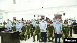 Nông dân Đồng Tâm tại phiên tòa ở Hà Nội kết thúc hôm 14/9/2020. VNA via Reuters