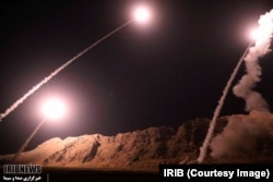 Iran’s Islamic Revolutionary Guard Corps fires missiles from the western province of Kermanshah on October 1, 2018. It said the targets were militants in the eastern Syrian town of Albu Kamal.