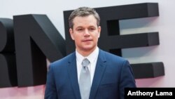 Matt Damon poses for photographers upon arrival at the European premiere of the film 'Jason Bourne' in London, July 11, 2016.