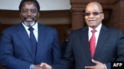 Le président de la RDC Joseph Kabila, avec le président de l'Afrique du Sud, Jacob Zuma, à Pretoria, le 25 juin 2017.