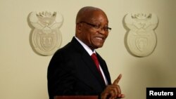 FILE - South Africa's President Jacob Zuma announces his resignation at the Union Buildings in Pretoria, South Africa, Feb. 14, 2018. 
