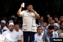 Indonesia's presidential candidate Prabowo Subianto speaks to his supporters after this week's presidential election in Jakarta, Indonesia, April 19, 2019.