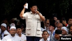 FILE - Indonesia's presidential candidate Prabowo Subianto speaks to his supporters after this week's presidential election in Jakarta, Indonesia, April 19, 2019.