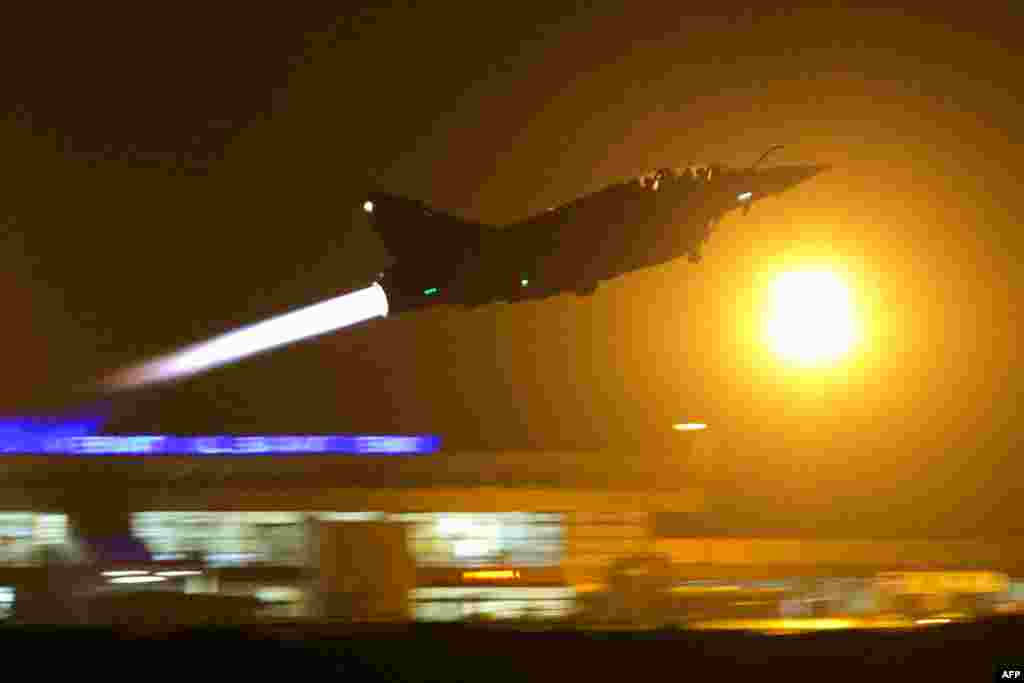 A French Mirage 2000 fighter jet of the Nancy-based 3/3 Fighter Squadron Ardennes takes off early for a Close Air Support (CAS) mission from Bamako's airport, Mali.