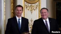 Državni sekretar Majk Pompeo i šef britanske diplomatije Džeremi Hant na razgovorima u Londonu, 8. maja 2019.