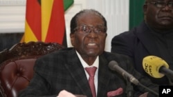 Zimbabwean President Robert Mugabe delivers a live speech to the nation, at State House, in Harare, Zimbabwe, Nov, 19, 2017. Mugabe baffled the country by ending his address without announcing his resignation.