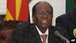 FILE: Zimbabwean President Robert Mugabe delivers a live speech to the nation, at State House, in Harare, Zimbabwe, Nov, 19, 2017. Mugabe baffled the country by ending his address without announcing his resignation.