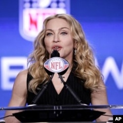 Madonna speaks during a news conference for NFL football's Super Bowl XLVI's halftime show in Indianapolis, February 2, 2012.