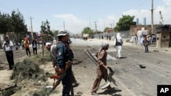 Suasana di sekitar lokasi bom bunuh diri di Kabul, Afghanistan, 31 Mei 2019. 