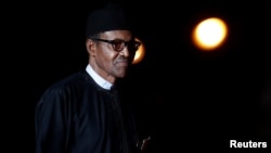 Nigeria's President Muhammadu Buhari arrives at the Orsay Museum, in Paris, Nov. 10, 2018.