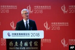 Tim Cook, Apple CEO delivers his speech at the opening ceremony of the China Development Forum held at the Diaoyutai State Guesthouse in Beijing, March 25, 2018.