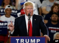 FILE - Republican presidential candidate Donald Trump speaks in Albuquerque, N.M.