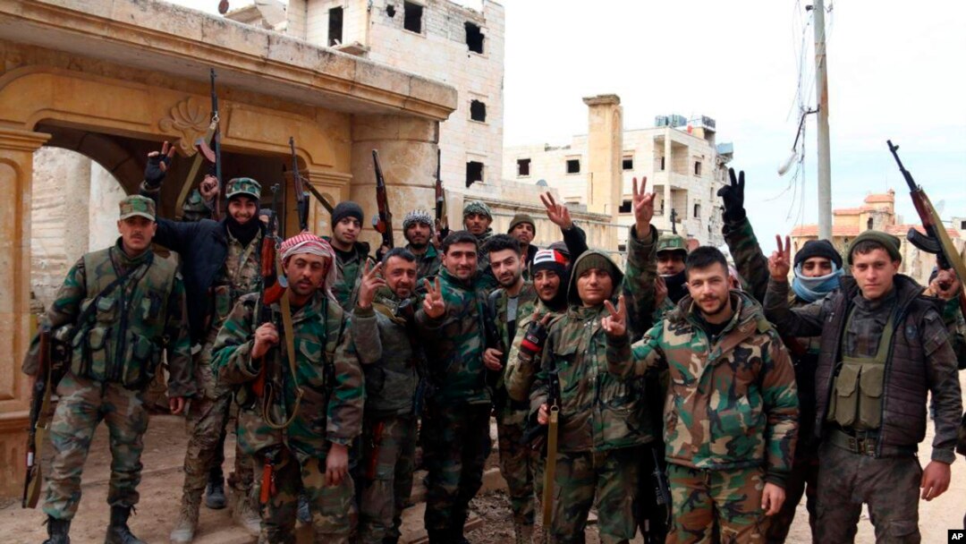 Iabasirikare ba reta ya Siriya bishimira intsinzi ku gisagara ca Aleppo.
