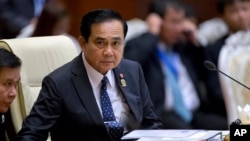 FILE - Thailand's Prime Minister Prayuth Chan-ocha attends the Association of Southeast Asian Nations (ASEAN) plenary session at Myanmar International Convention Center in Naypyitaw, Myanmar, Nov. 12, 2014. 