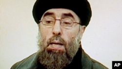 FILE - Afghan rebel leader Gulbuddin Hekmatyar is seen in this photo grab from a video received by Associated Press Television in Karachi, Pakistan. Seeking to gain new leverage, the notorious Afghan warlord who was designated a "global terrorist" by the 