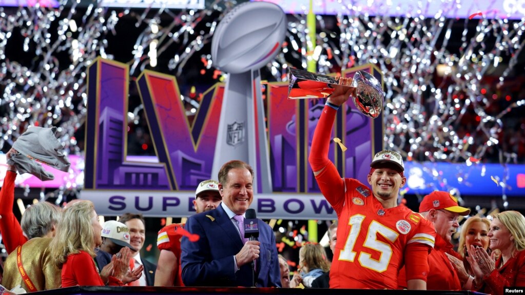 Kansas City Chiefs' Patrick Mahomes celebrates with the Vince Lombardi Trophy after winning Super Bowl LVIII on Feb. 11, 2024.