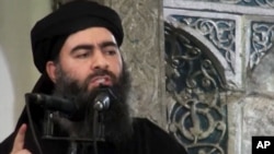 ຜູ້ນຳກຸ່ມ​ລັດ​ອີສລາມ ທ້າວ Abu Bakr al-Baghdadi, 5 ກໍລະກົດ, 2014.